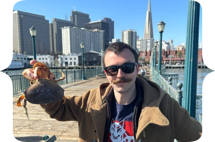 Myself on a pier at San Francisco, holding a crab we just fished. Our friends who hosted us took us to the port to fish crabs. We kept none because they were too small, and to be honnest I don't trust San Francisco's port water quality